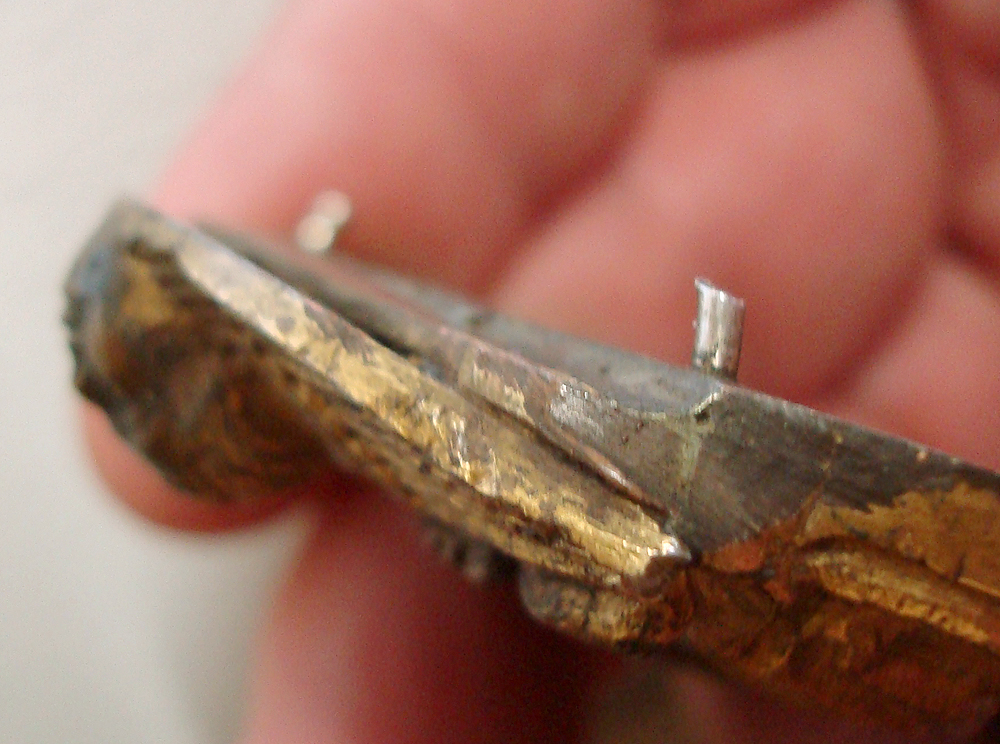 Fig. 10: Detail of the integral lower extension on the reverse of the Virgin-Child applique (Kollenburg Antiquairs)