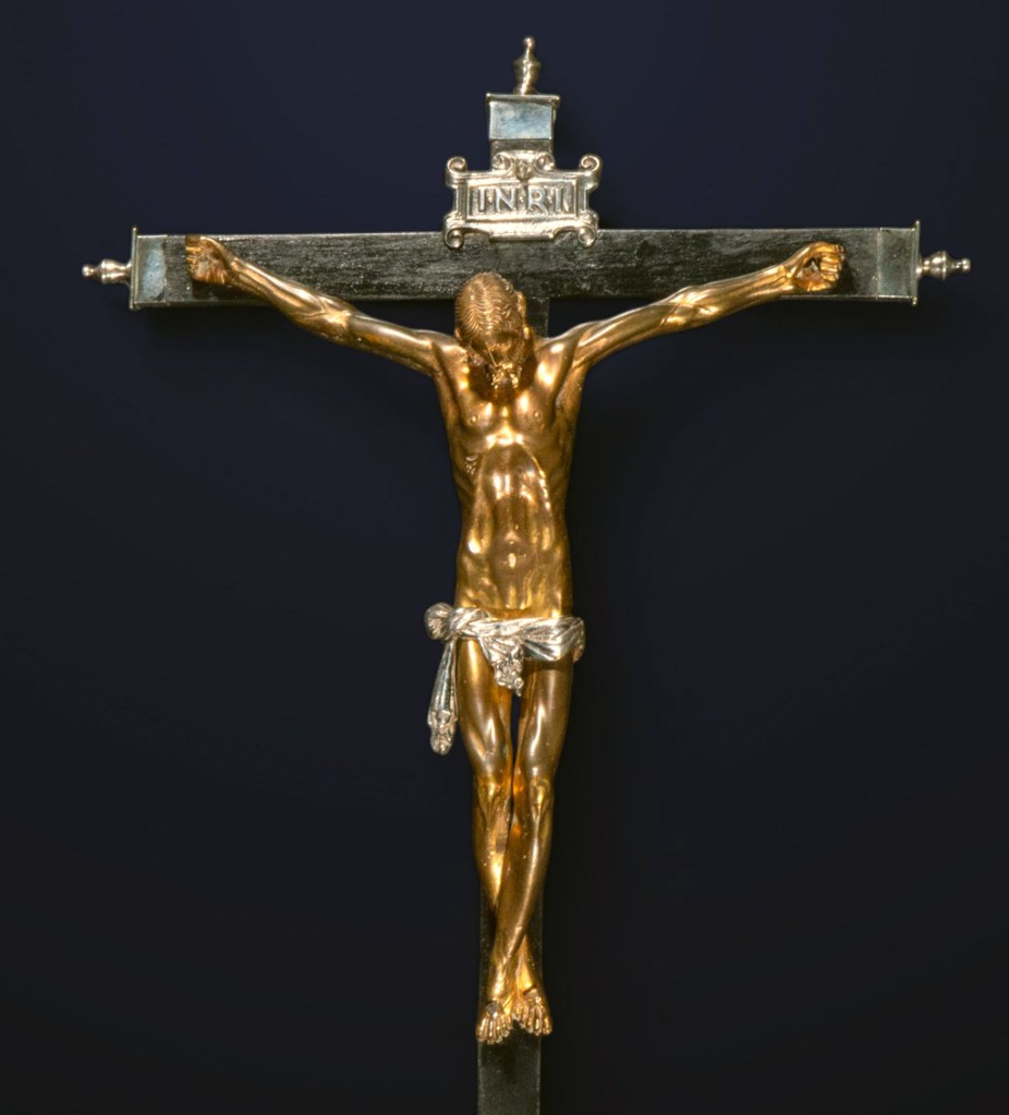 Fig. 26: a gilt copper crucifix after a model by Michelangelo, circle or atelier of Andres de Campo Guevara, ca. mid-17th century (art market; Templum Fine Arts)